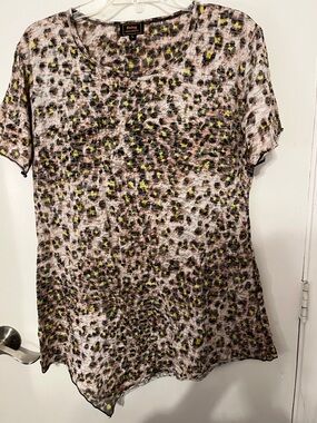 Rising International dress size large sheer material and uneven hem